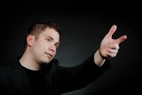 Man pointing at something interesting Stock Photos