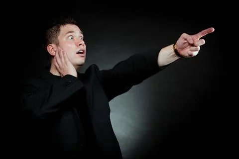 Man pointing at something interesting Stock Photos