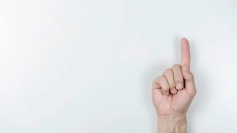 Man pointing at something on white background, closeup of hand Stock Photos