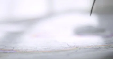 Man is pointing visited place using red flag pin on a map. Stock Footage 107597223