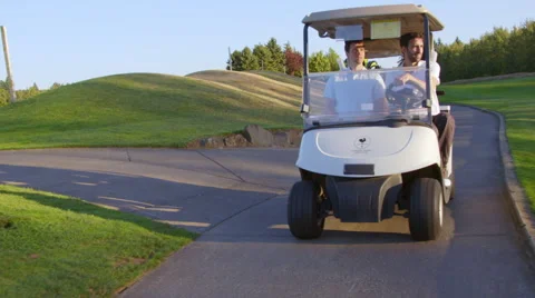 Man points to golf flag from the cart Stock Footage 60077926
