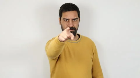 Man points with his finger making the gesture of a reminder to you. Video stock 165903846