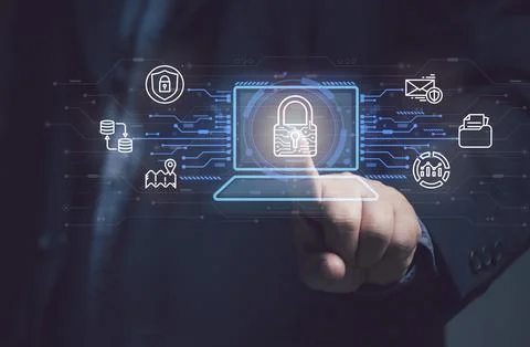 Man points at key icon on virtual screen of laptop Protecting security in o.. Stock Photos