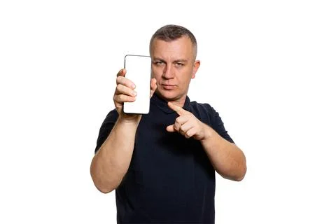 The man points to the phone. Stock Photos
