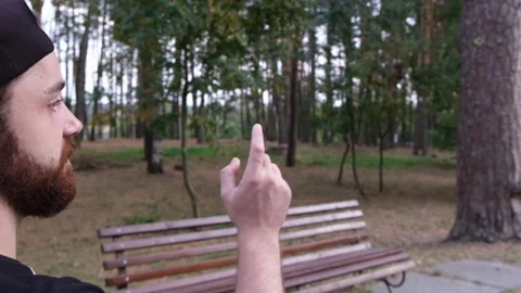 Man points the road at forest park Video stock 119148113
