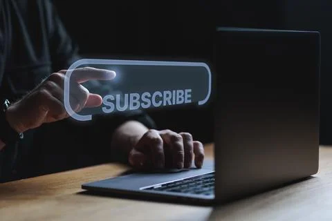 Man points on subscribe button. Visual concept of subscribe advertising Stock Photos