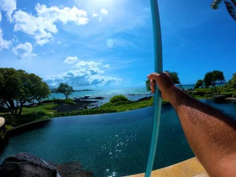 Man With Pole By Beach epic view Hawaii Stock Photos