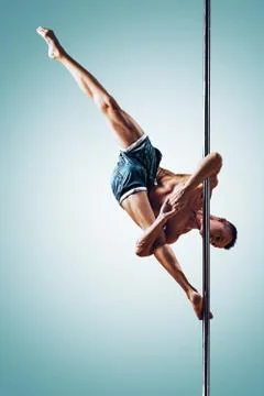 Man pole dancing 스톡 사진