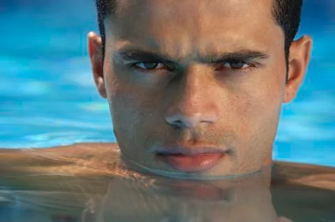 Man in pool Stock Photos