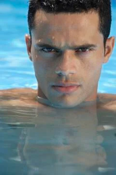 Man in pool Stock Photos