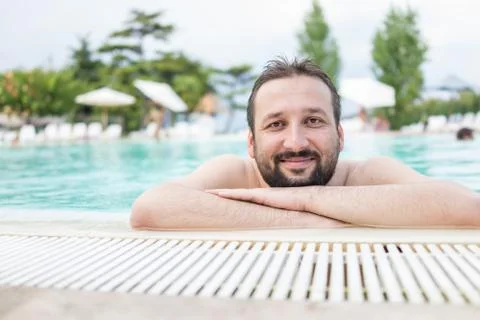 Man on pool Stock Photos