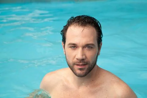 Man in the pool relaxed 스톡 사진