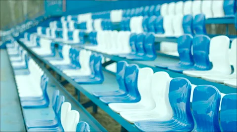 Man with popcorn sitting on the tribune Stock Footage 63842107
