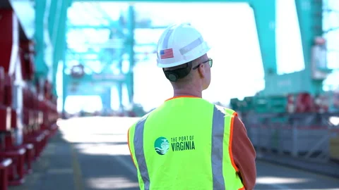 Man at port looking at cranes Stock Footage 171591016
