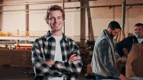 Man, portrait and carpenter in workshop with arms crossed, lumber productio.. Stock Photos
