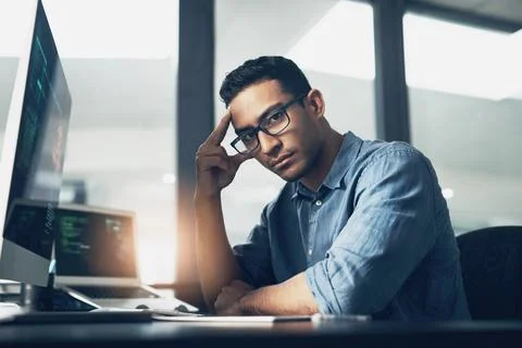 Man, portrait and programmer with computer in office for software engineering or 写真素材