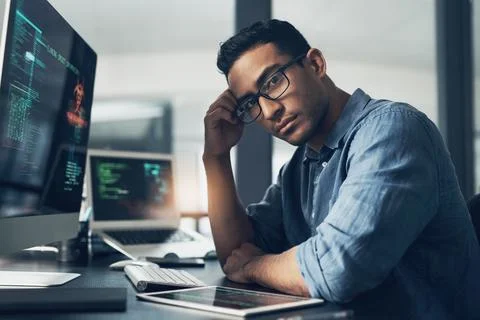 Man, portrait and software engineer with computer in office for coding Stockfoto's