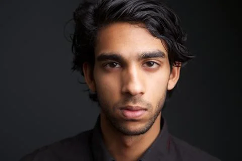 Man posing against gray background Foto stock