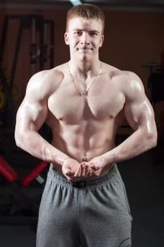 Man posing bodybuilder Stock Photos