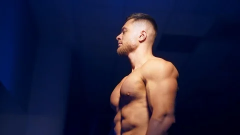 Man posing in gym Stock Footage 119263725