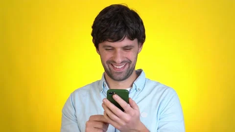 Man posing isolated on yellow background in studio. People sincere emotions Stock-Footage 145656273