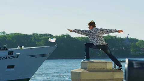 Man posing in the port Stock Footage 99912373