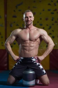 Man Posing With Supplements For Copy Space Stock Photos