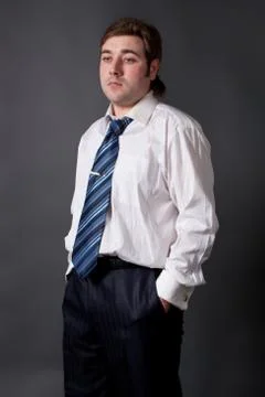 Man posing in white shirt Stock Photos