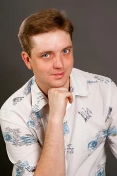 Man posing in white shirt Stock Photos