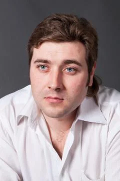 Man posing in white shirt Stock Photos