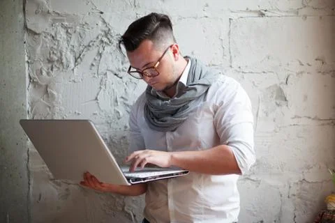 Man posing on workplace in startup office Stock Photos