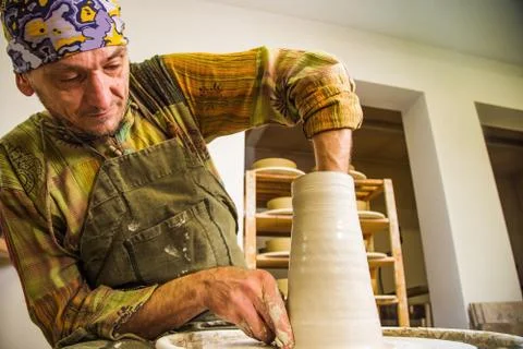 Man potter in workshop Stock Photos