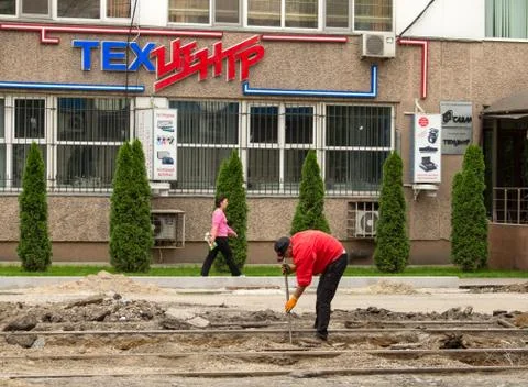 The man is pounding the asphalt Stock Photos