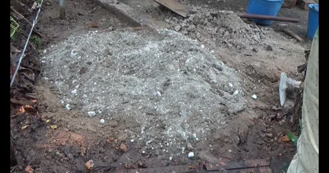 Man pouring concrete yard Stock Footage 312204662