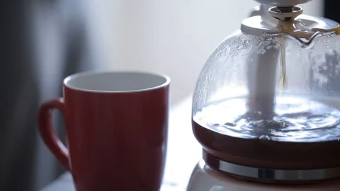 Man pouring a cup of coffee Video stock 88950360