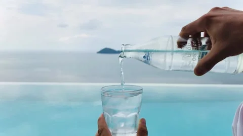 Man pouring water Stock Footage 156007645