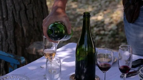 The man is pouring wine Stock Footage 89576083