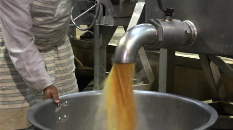 Man pours boiling water into a large metal tank Vídeo Stock 61208218