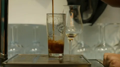 A man pours a draft beer Stock Footage 119590629