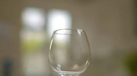 Man pours glass of red wine Stock Footage 22232020
