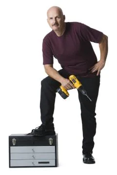 Man with power drill Foto stock