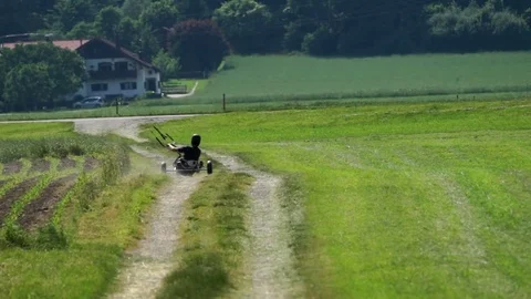 Man powered paragliding in the field Stock-Footage 77811548