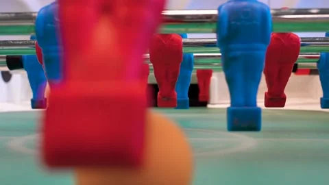A man practices kicker table football throws, Recreation and leisure concept Stock Footage 306286335