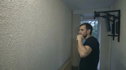 Man practicing blows in the hallway 스톡 동영상 155463965
