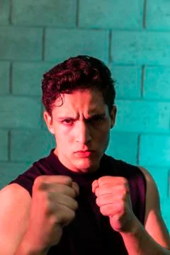 Man practicing box in a cellar Stock Photos