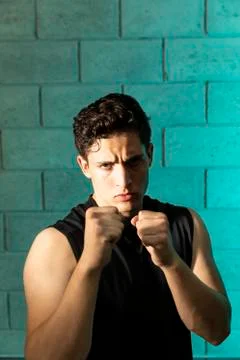 Man practicing box in a cellar Stock Photos