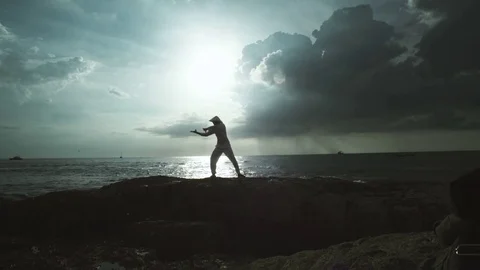 Man Practicing Breathing Exercises On Nature Stock Footage 70805205