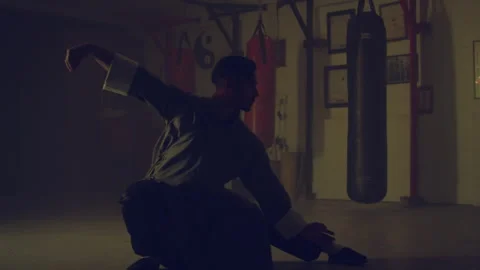 Man practicing energy control in martial arts Stock Footage 279842595