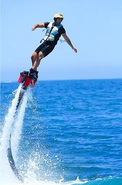 Man Practicing Fly Boarding Stock Photos