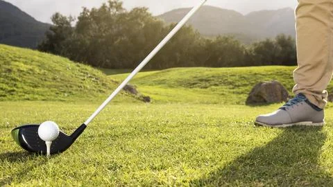 Man practicing golf field Stock Photos